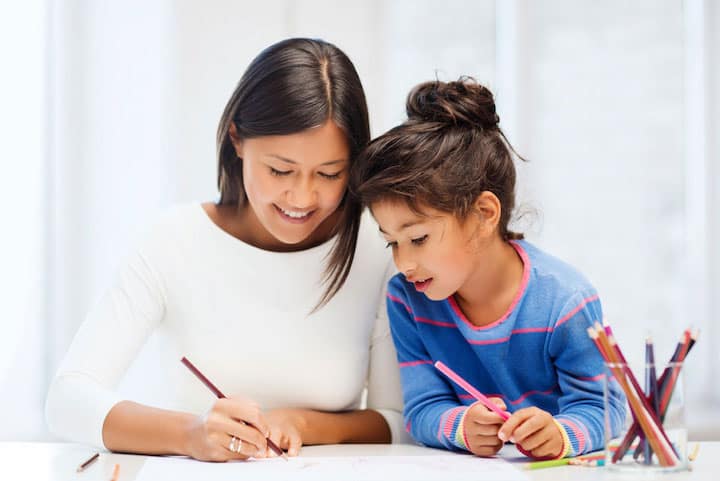 mother and daughter drawing